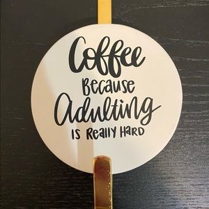 Coffee mug wall hanger.